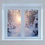 early morning view of the winter forest from the window.