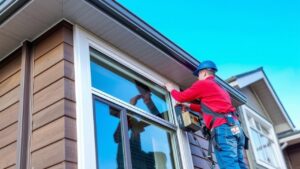 a window specialist seal gaps in windows to prevent drafts on a modern home in calgary