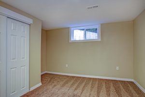 empty room, sand beige walls, carpet floor in a luxury home.