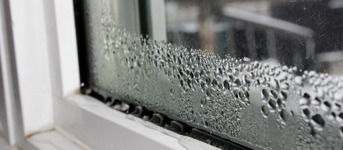 Water condensation on windows during winter.